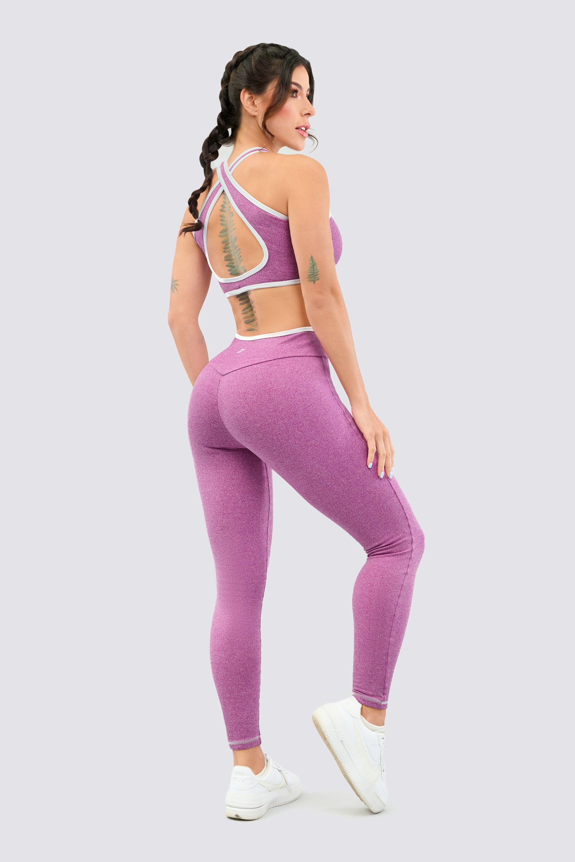 Seamless sporty purple jumpsuit, back design, seams that visually create a perfect silhouette.