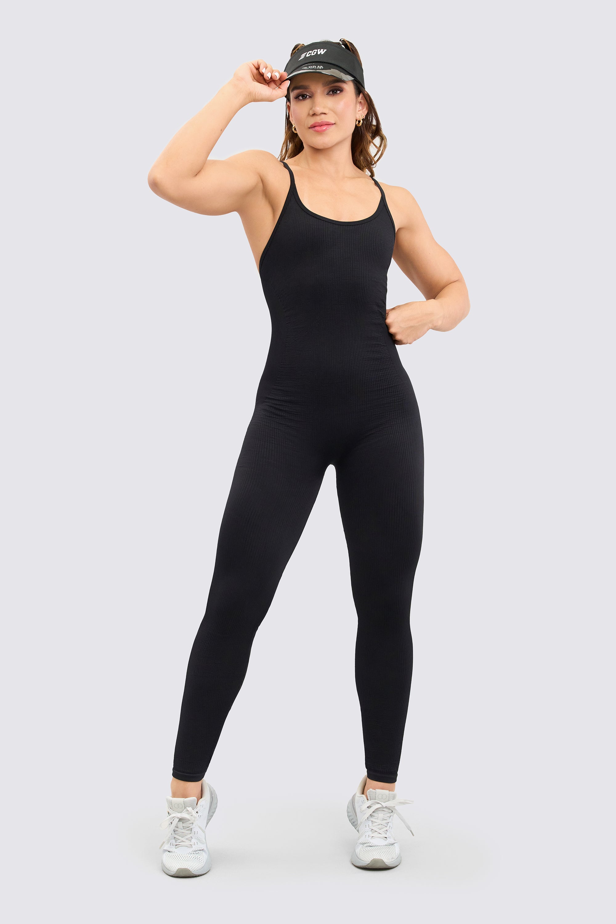 This black bodysuit suite is the ultimate fusion of rebellious style and a seamless fit that hugs without pressure.  